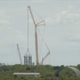 Earlier today, a crane creating the first stack for a tower that will eventually reach more than 400 feet in height.